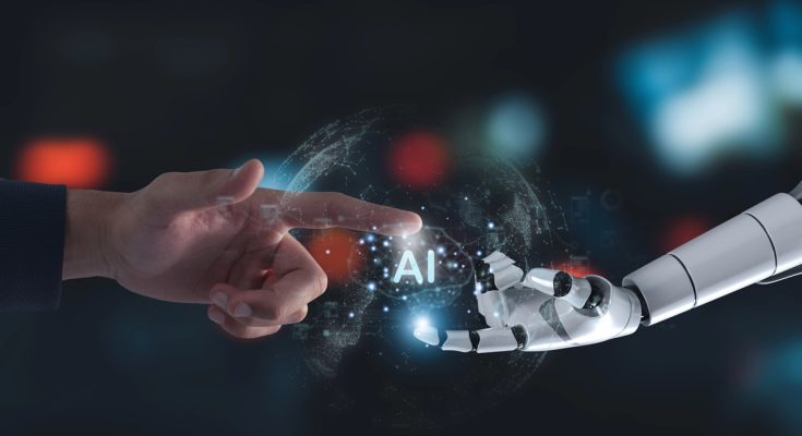 Mano de robot tocando mano humana simbolizando la conexión